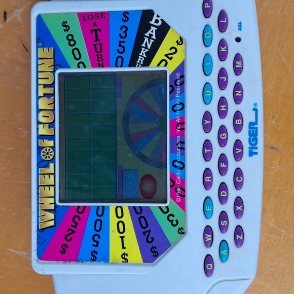 Vintage 1999 Tiger Wheel of Fortune hand held electronic game show game Tested - Picture 3 of 11